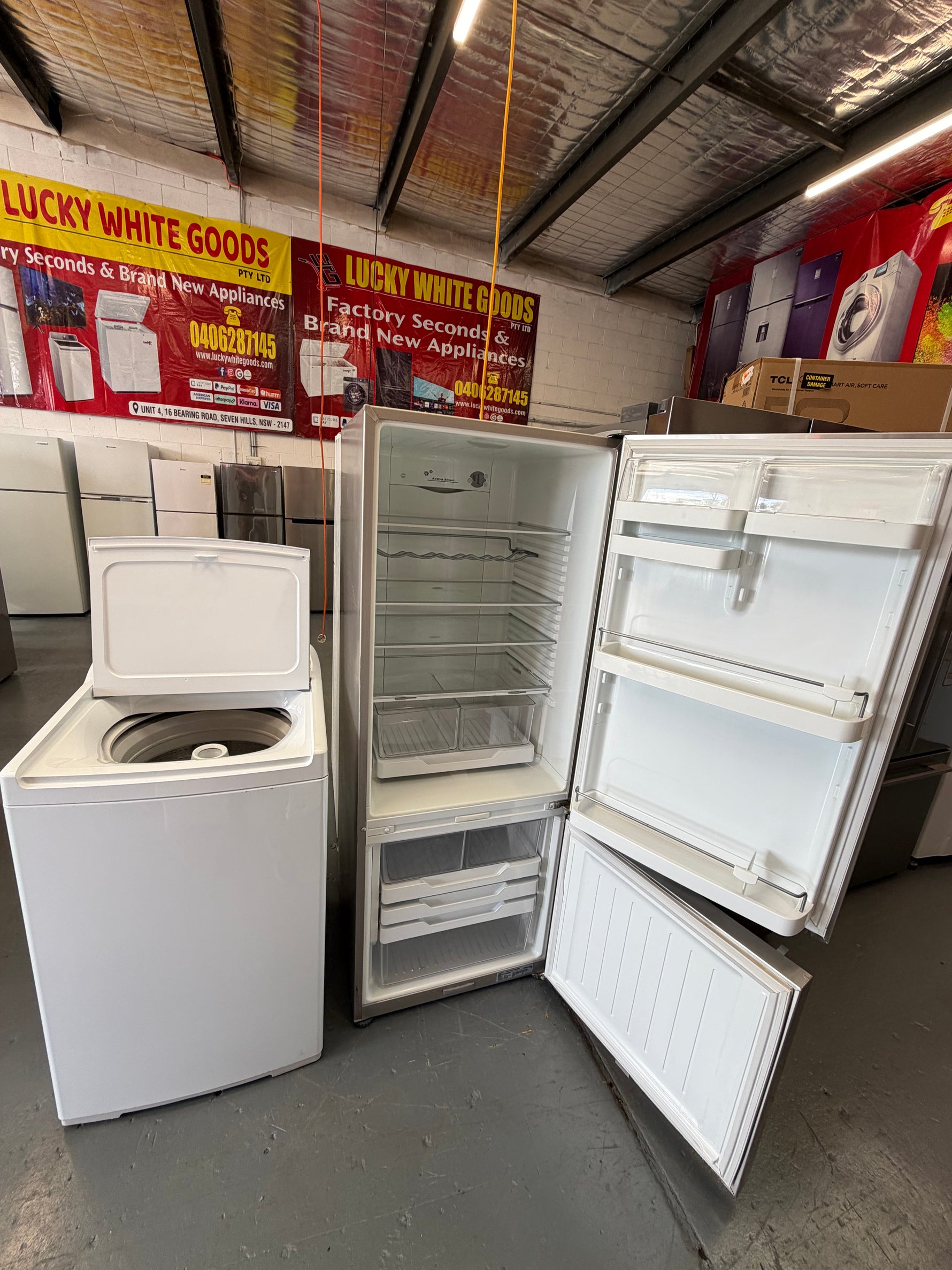 Refurbished Combo Fisher & Paykel 402 ltr bottom mount fridge freezer and Fisher And Paykel 8 kg top loader washer