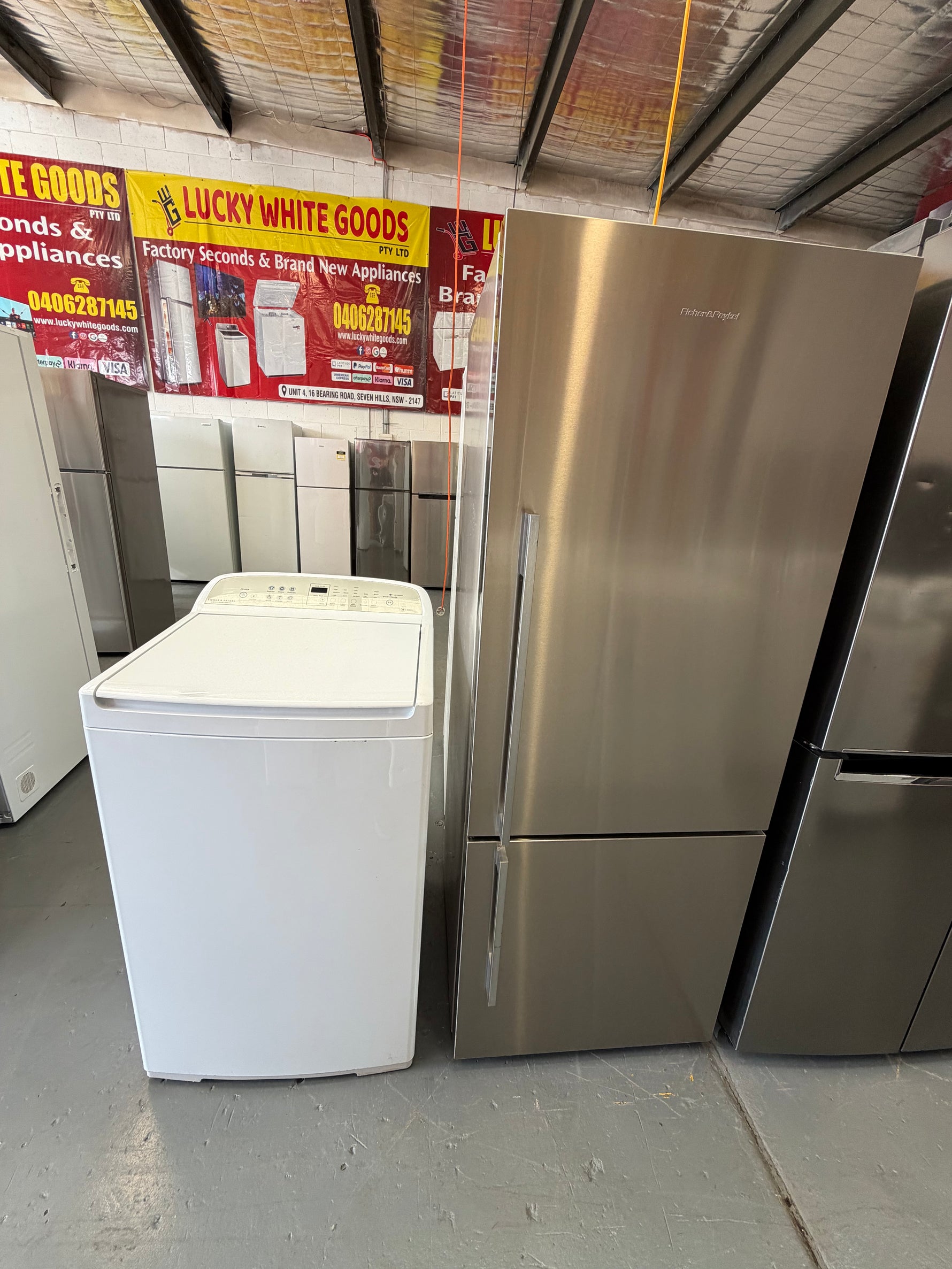 Refurbished Combo Fisher & Paykel 402 ltr bottom mount fridge freezer and Fisher And Paykel 8 kg top loader washer