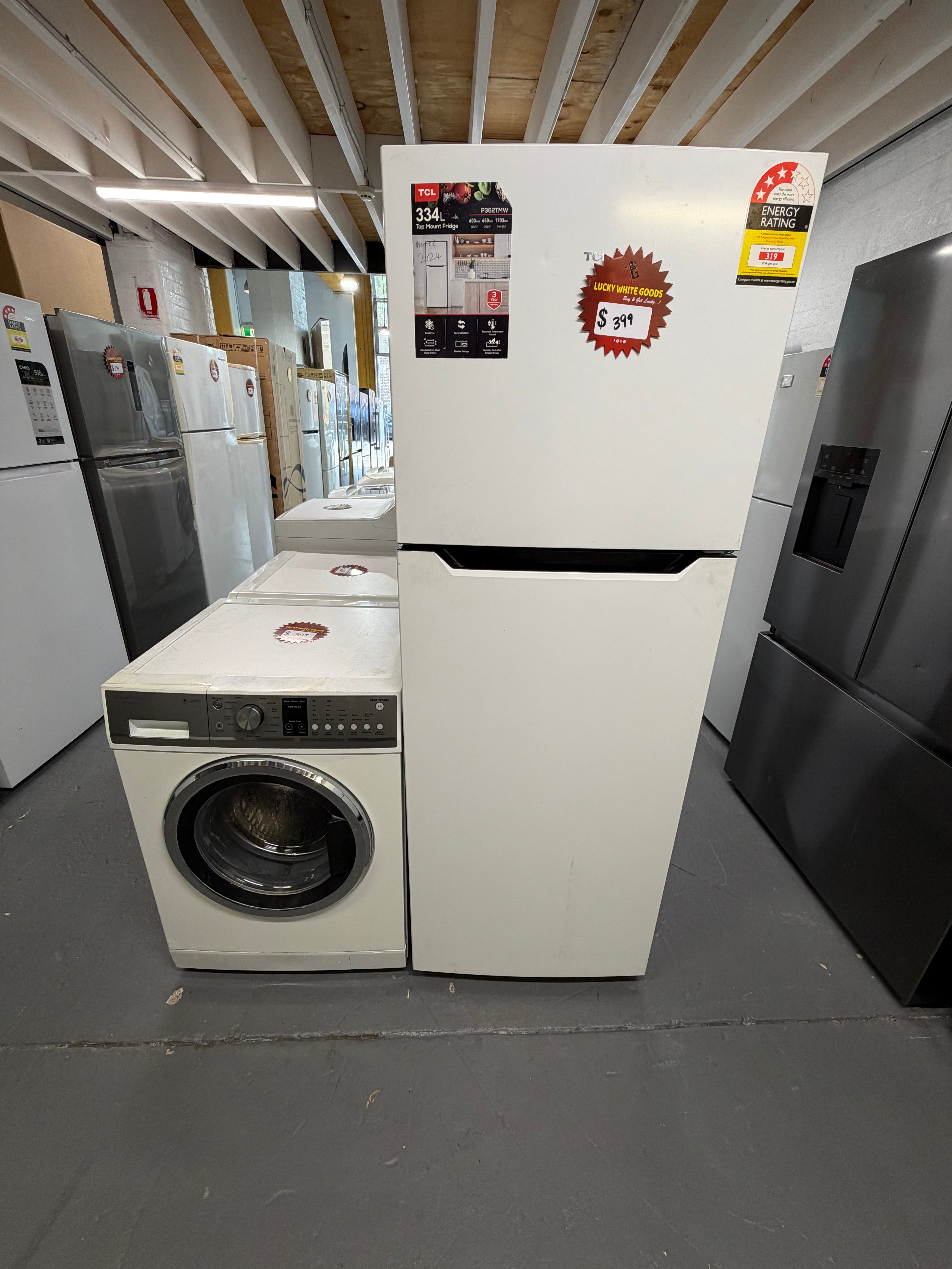 Refurbished combo Tcl 334 ltr top mount fridge freezer and Fisher & Paykel 7.5 kg front loader washer | ALEXANDRIA