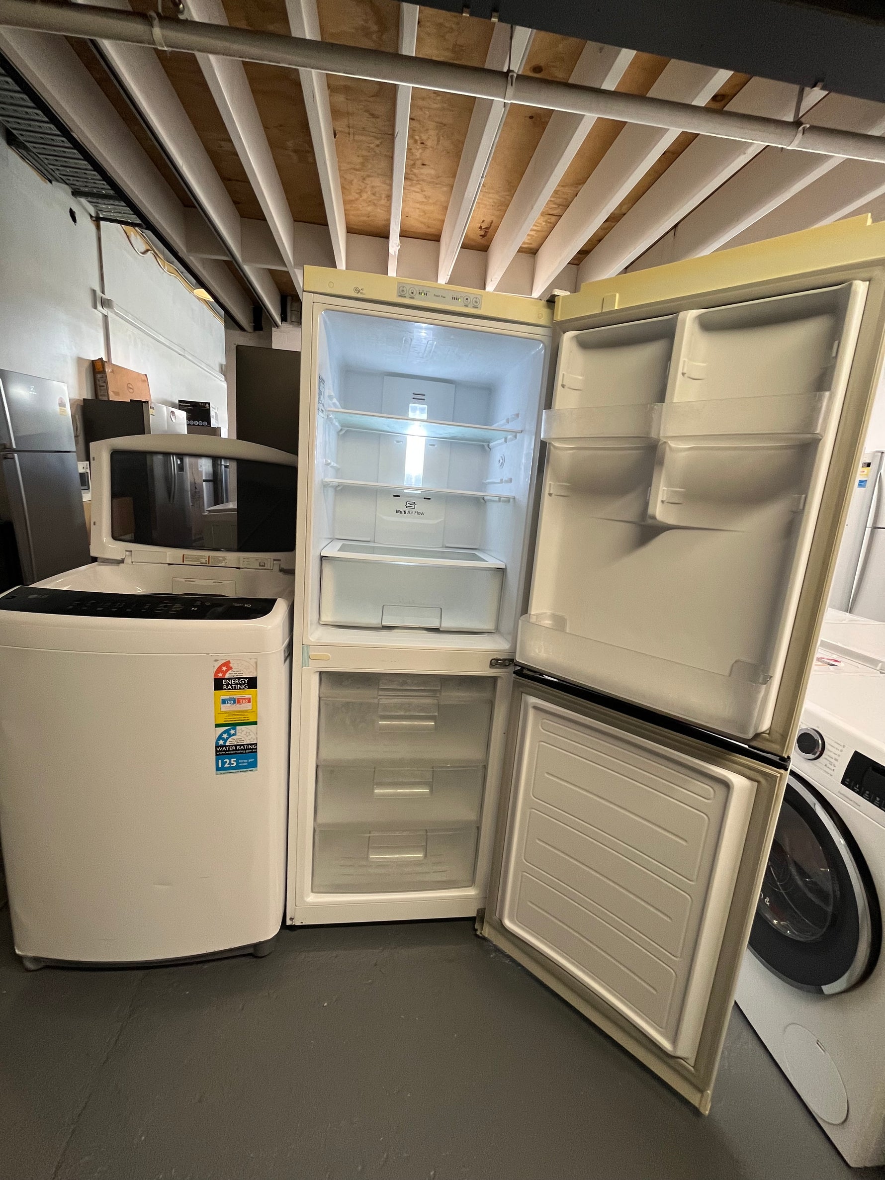 Refurbished Lg 310 bottom mount fridge freezer & Lg 8.5 kg top loader washer