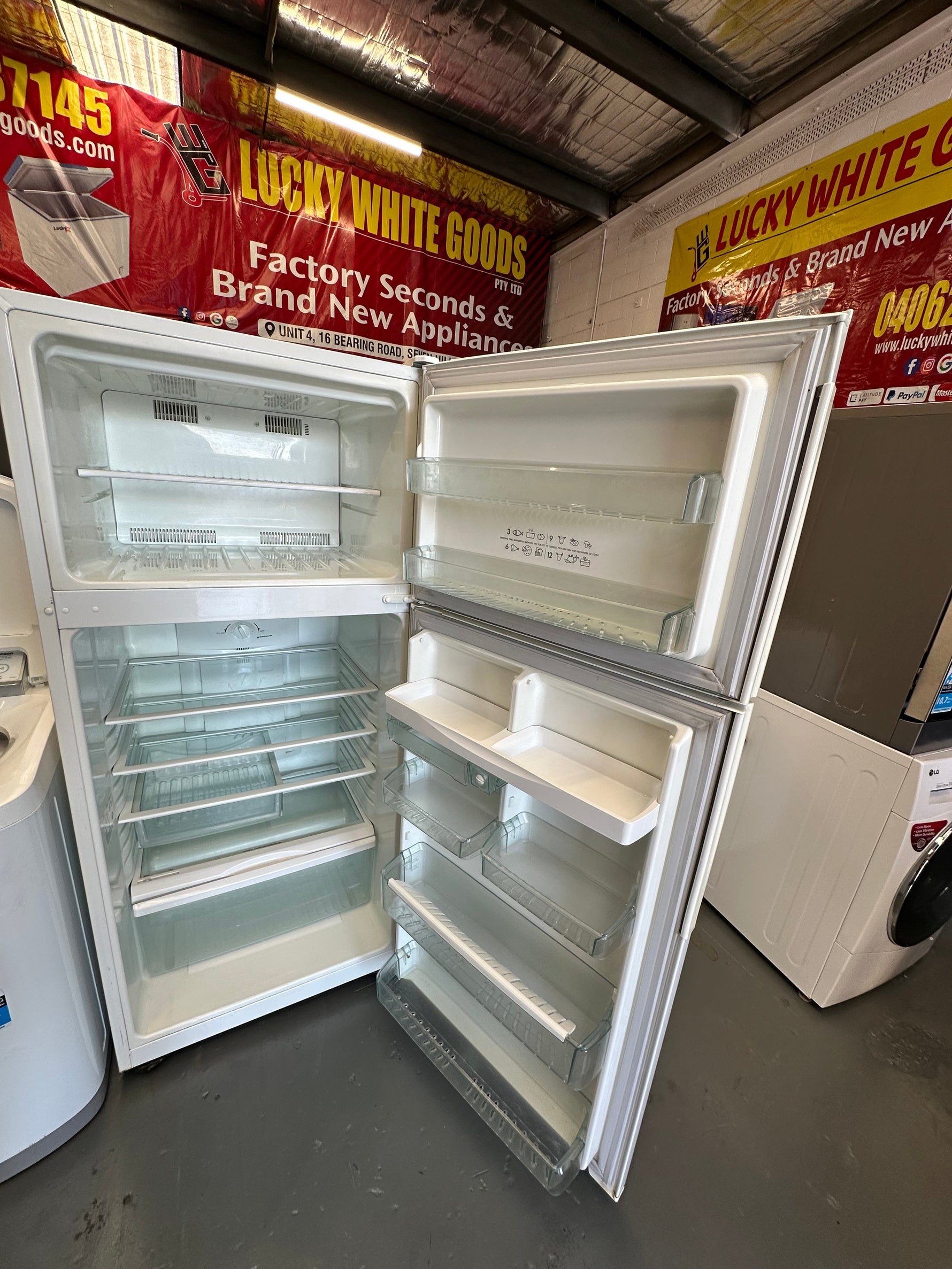 Refurbished Westinghouse 420 ltr fridge freezer & Simpson 5.5 kg top loader washer | Lucky white goods