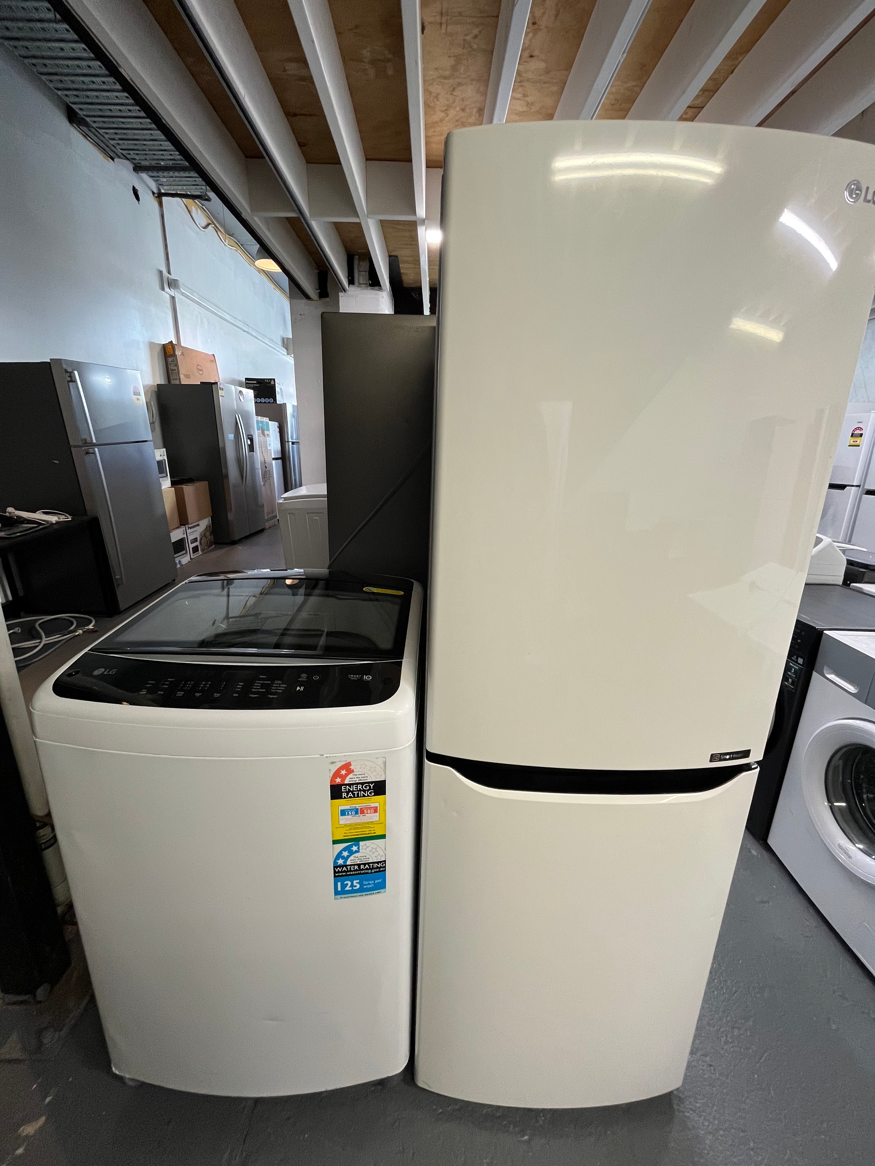 Refurbished Lg 310 bottom mount fridge freezer & Lg 8.5 kg top loader washer