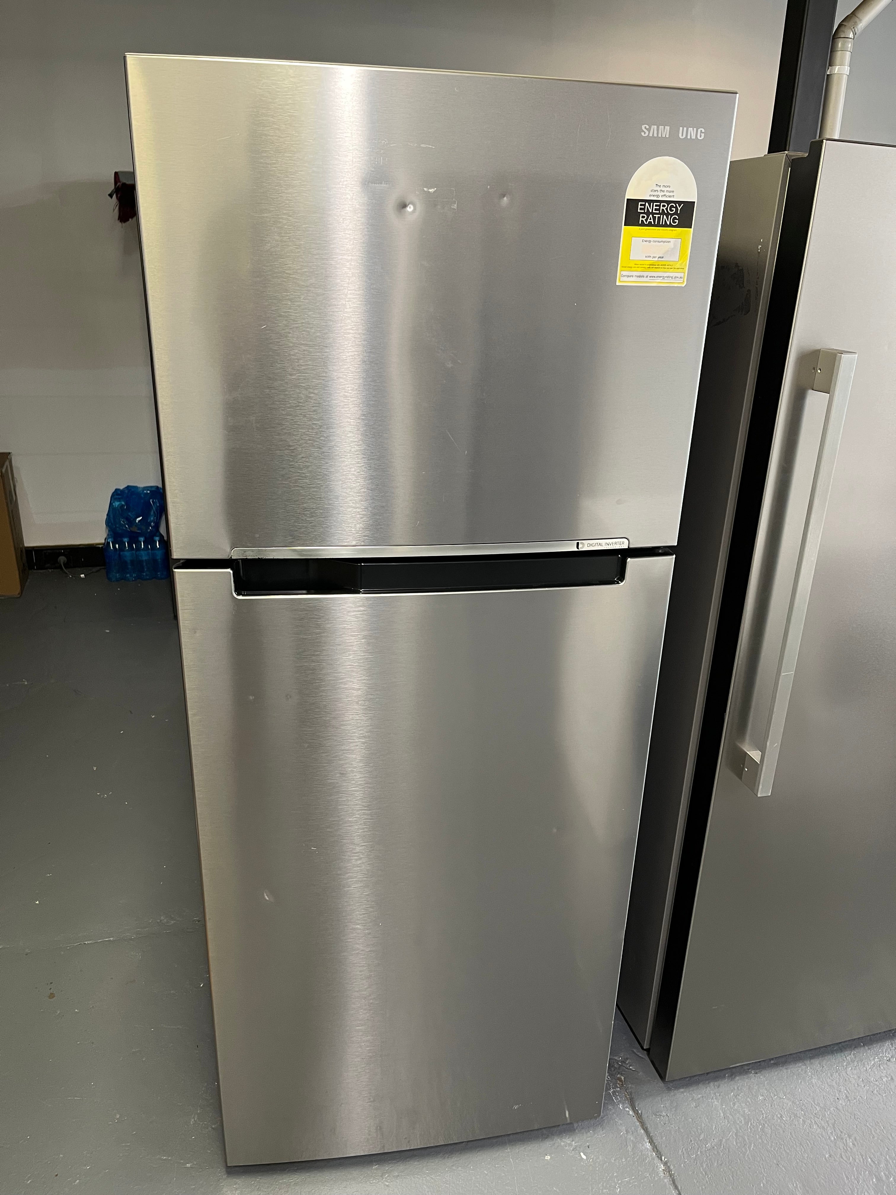 Refurbished Samsung 469 ltr top mount fridge freezer