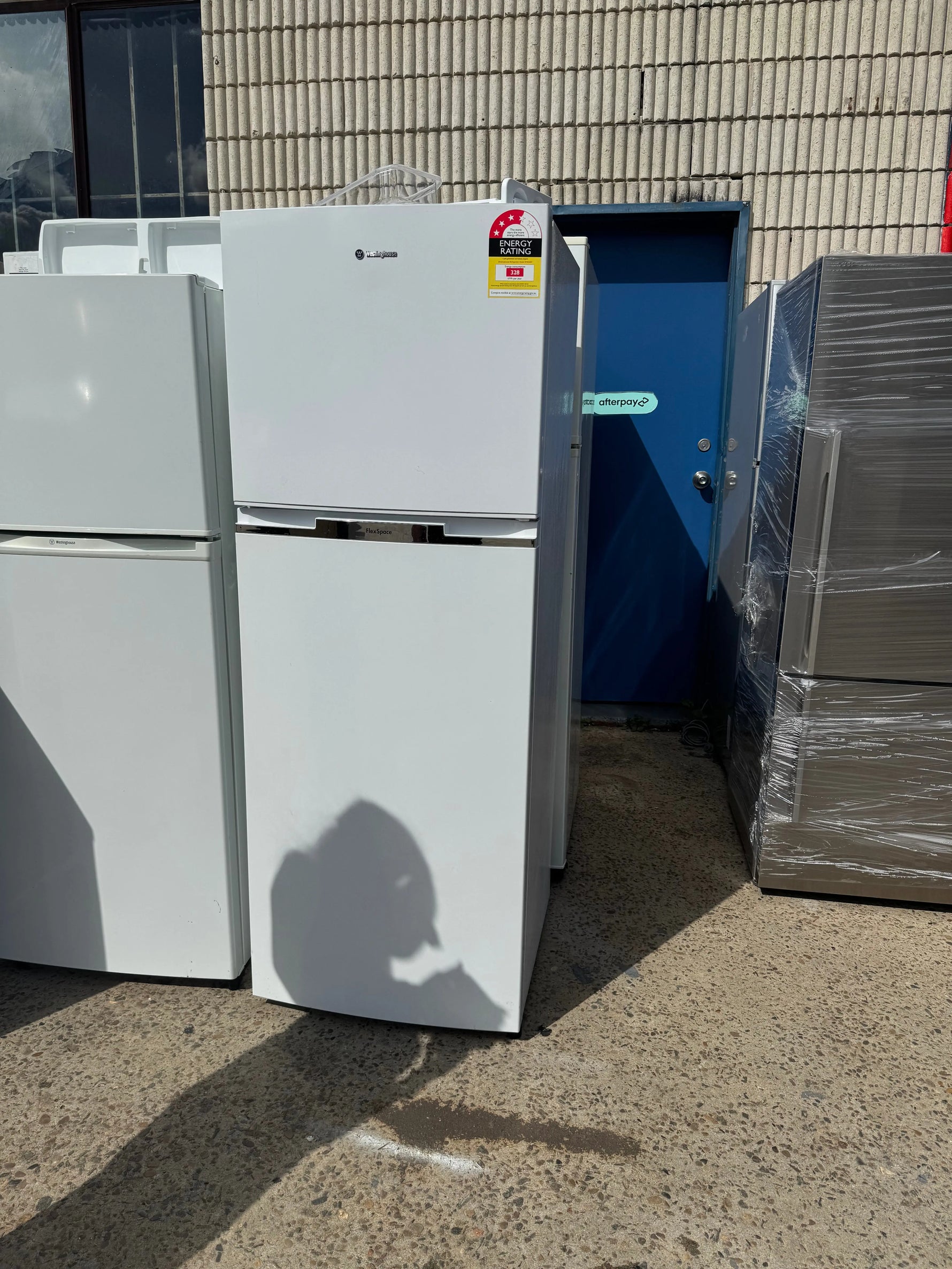 Combo refurbished Westinghouse 340  fridge & F&p 8.5 kg washer | SYDNEY