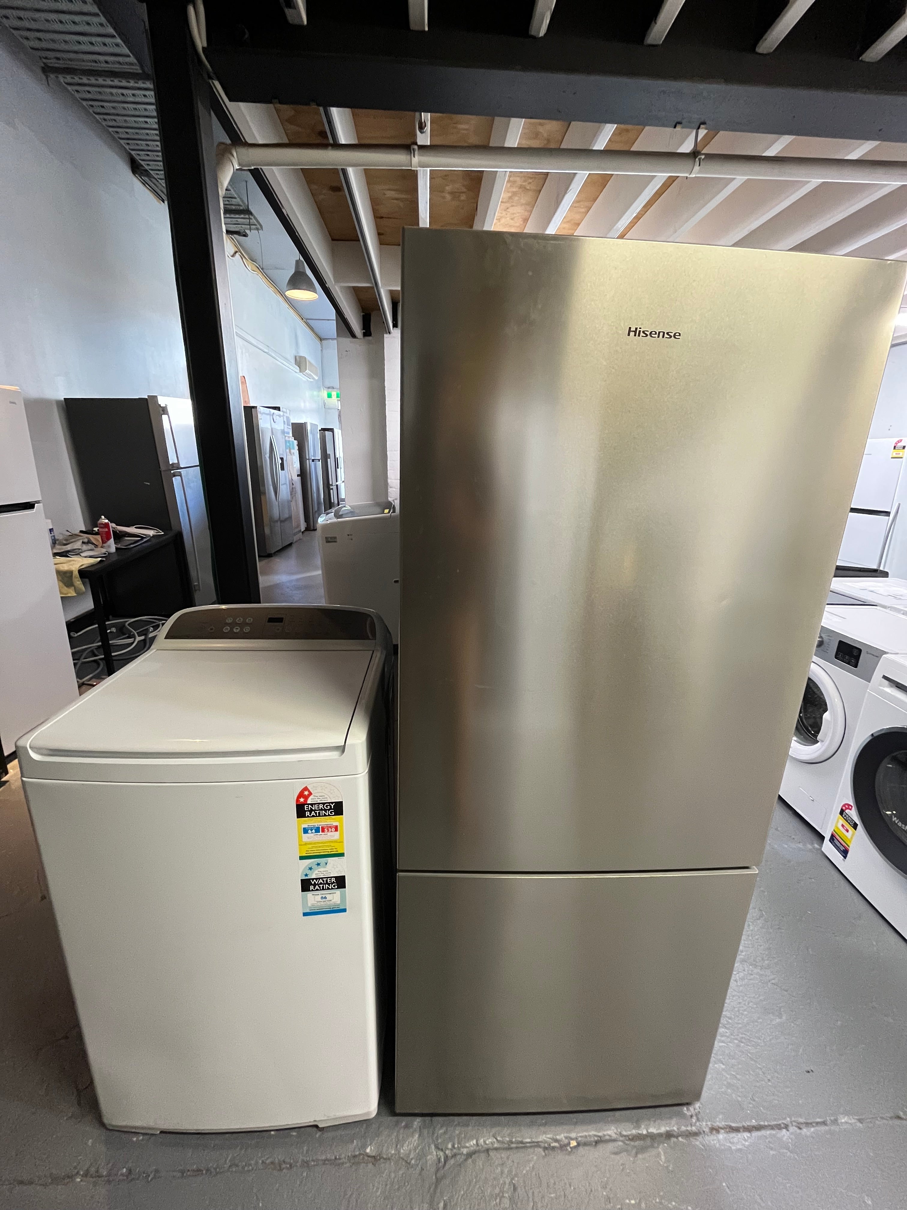 Refurbished combo Hisense 417 ltr bottom mount fridge freezer & Fisher & Paykel 7 kg top loader washer