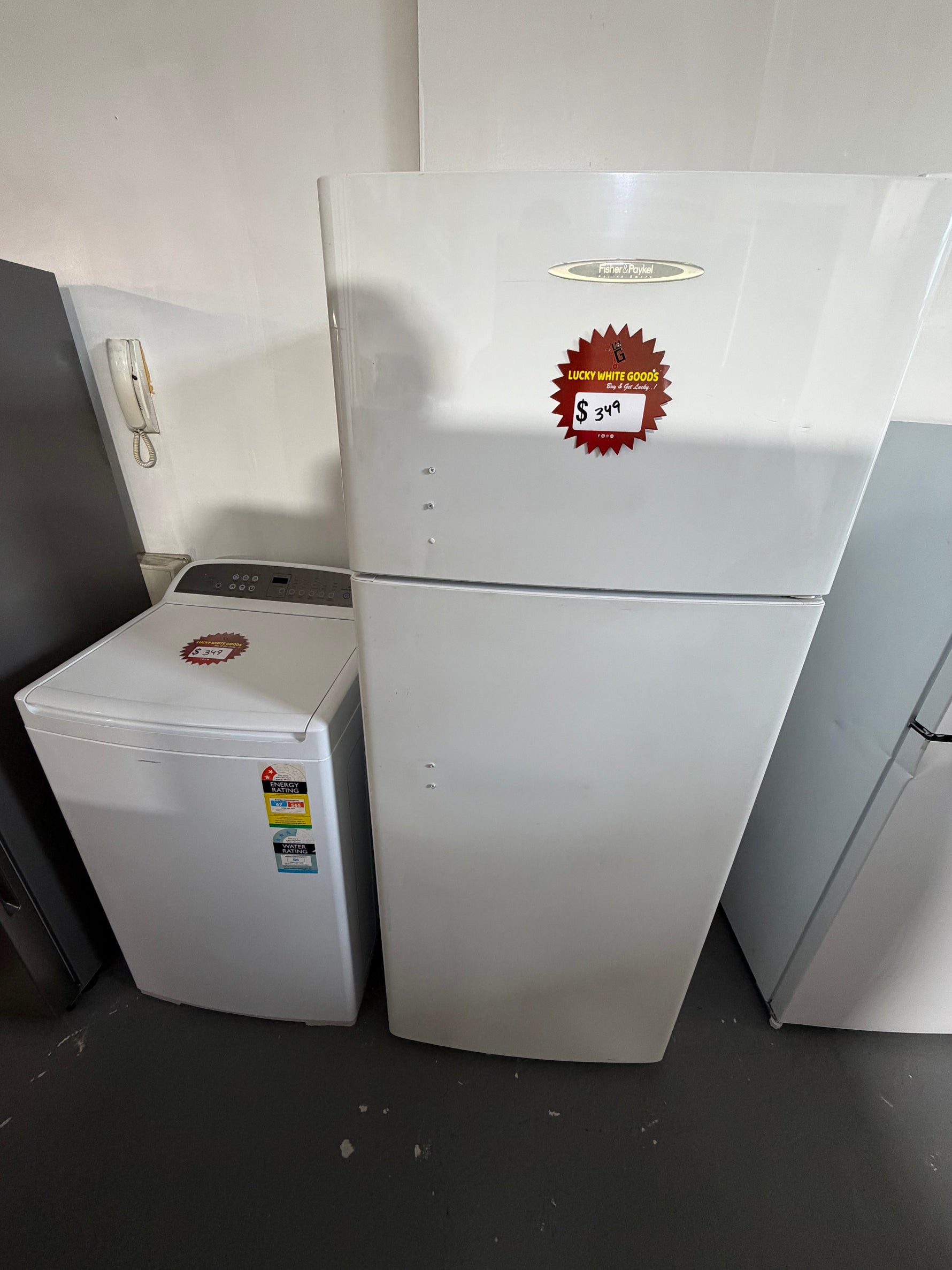 Refurbished combo Fisher & Paykel 400 ltr top mount fridge freezer and Fisher & Paykel 8 kg top loader washer | ALEXANDRIA