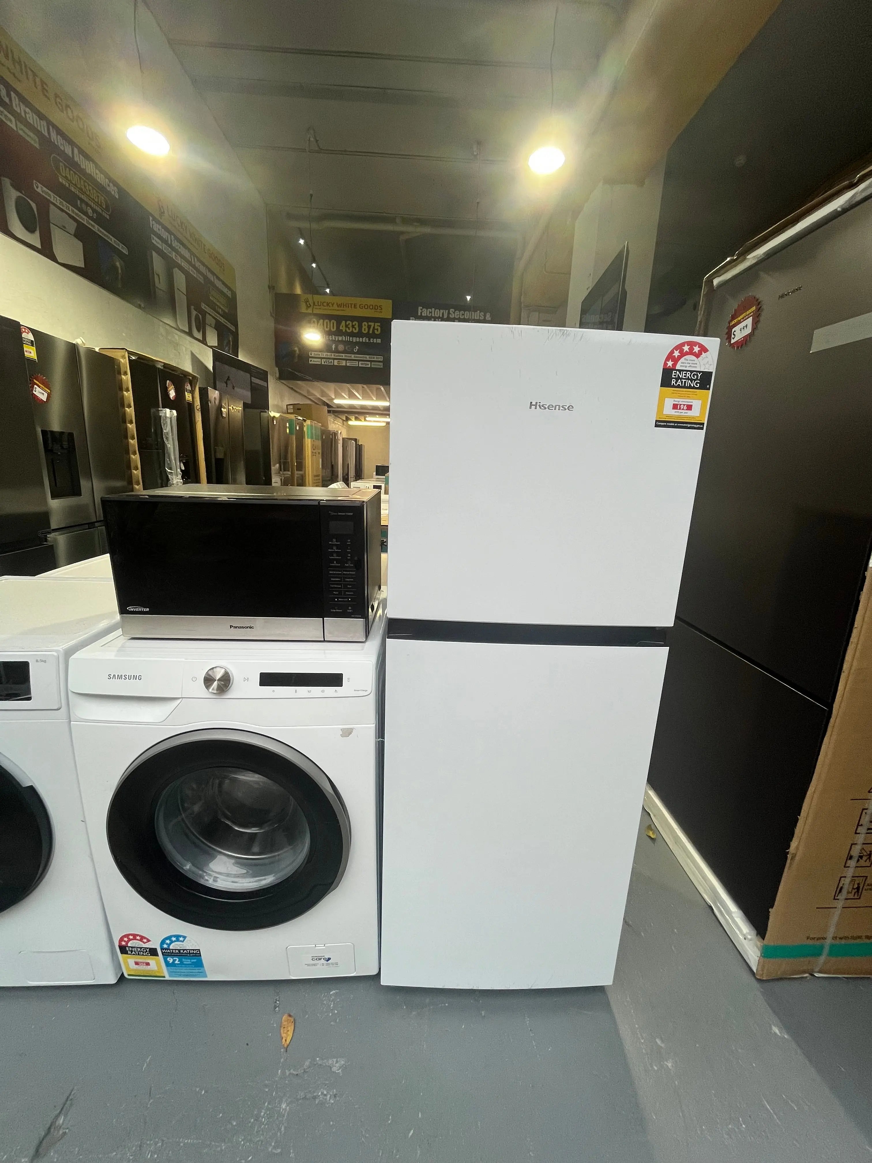 Factory Seconds Hisense Refrigerator/Freezer HRTF206 + Panasonic Microwave NN-ST665B And Refurbished Samsung 9kg Washer | Lucky white goods