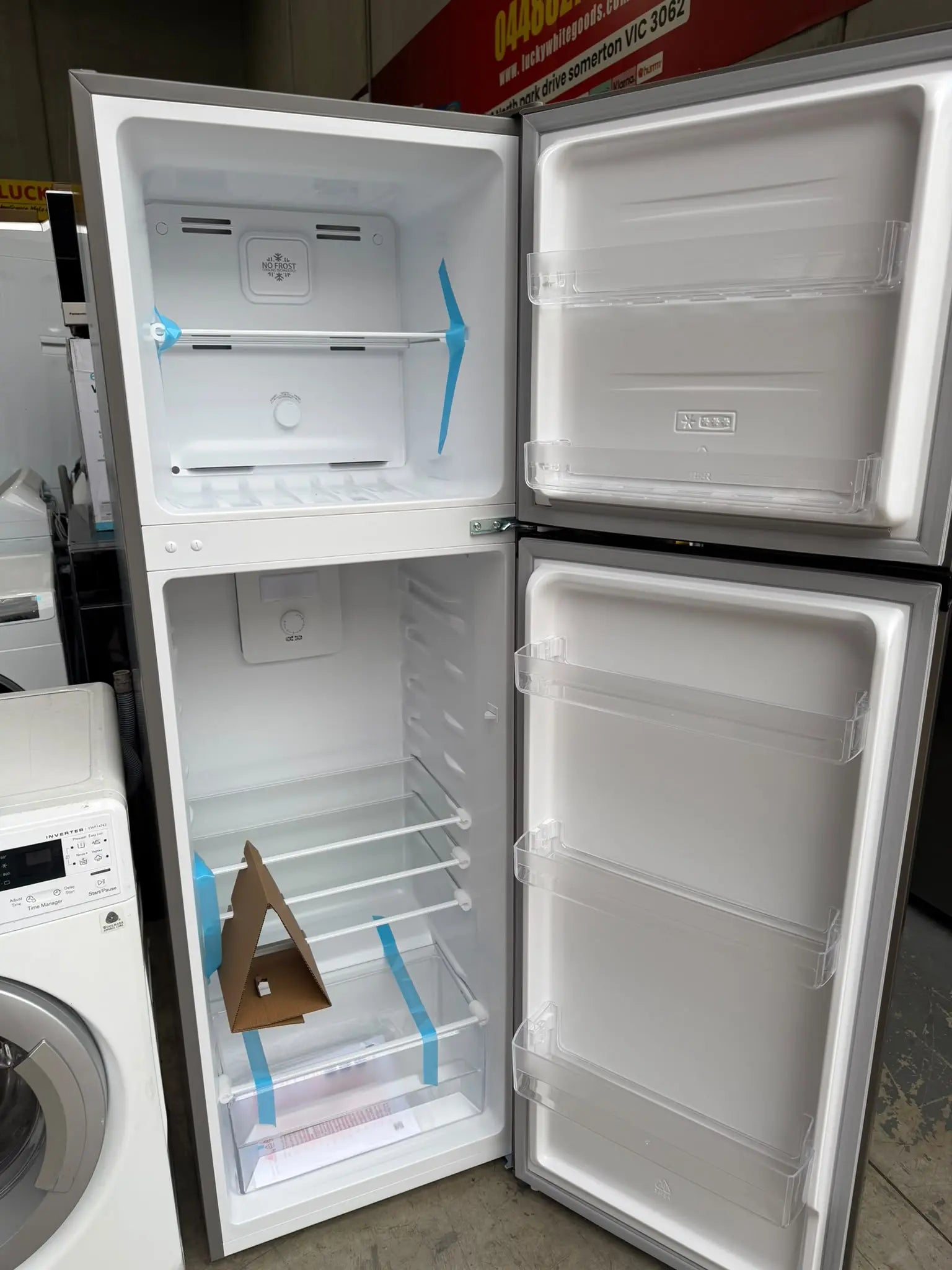 Kenmore 247L Fridge Freezer + Electrolux 7.5kg Washer Combo