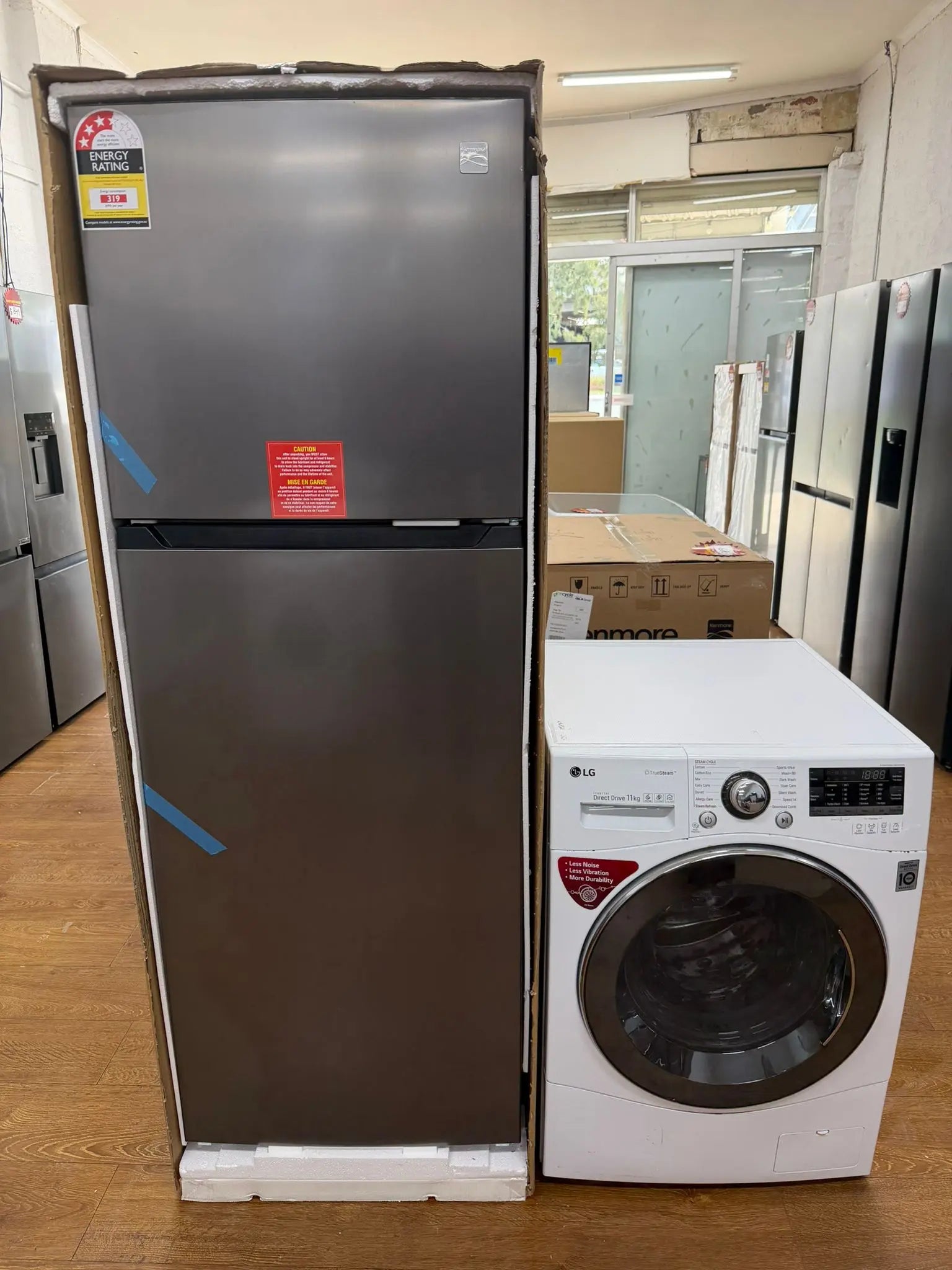 Kenmore 334L Fridge Freezer (KKTM670X334) Brand New + LG 11kg Front Load Washer with TrueSteam (WD1411SBW) Refurbished Bundle | RESERVOIR