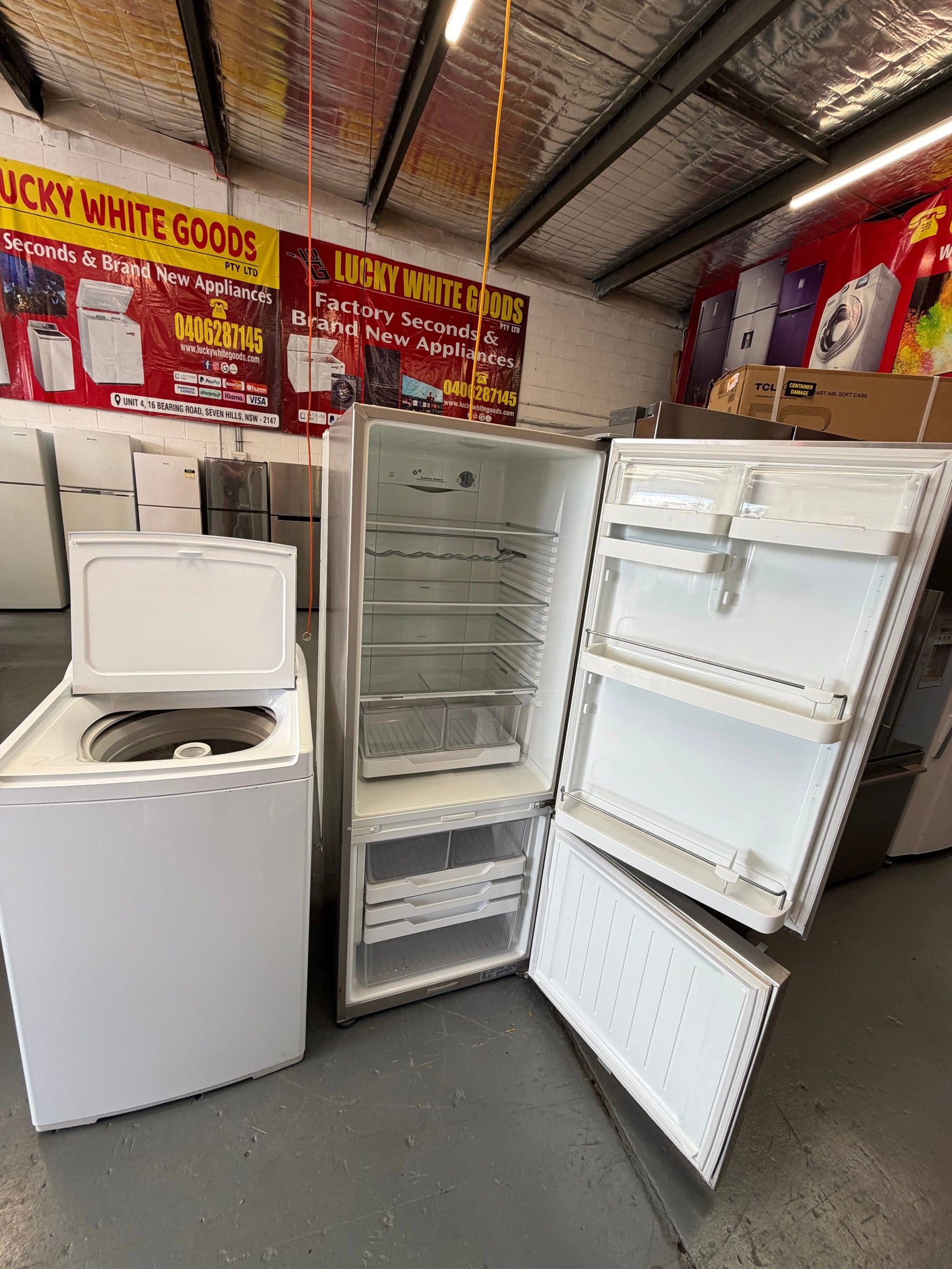 Refurbished Combo Fisher & Paykel 402 ltr bottom mount fridge freezer and Fisher And Paykel 8 kg top loader washer | ALEXANDRIA