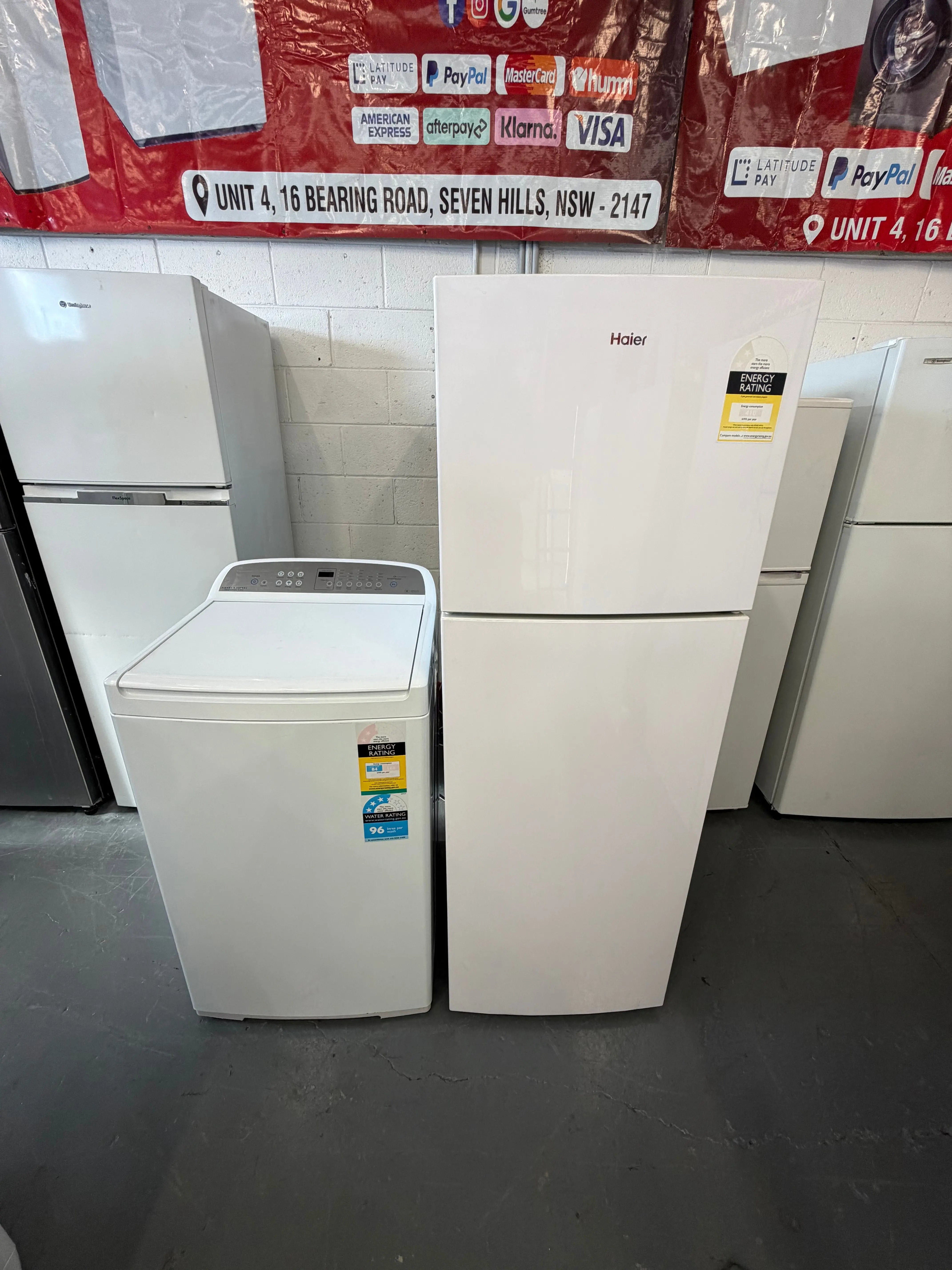 Refurbished Combo Haier 260 ltr top mount fridge freezer and Fisher & Paykel 8 kg top loader washer