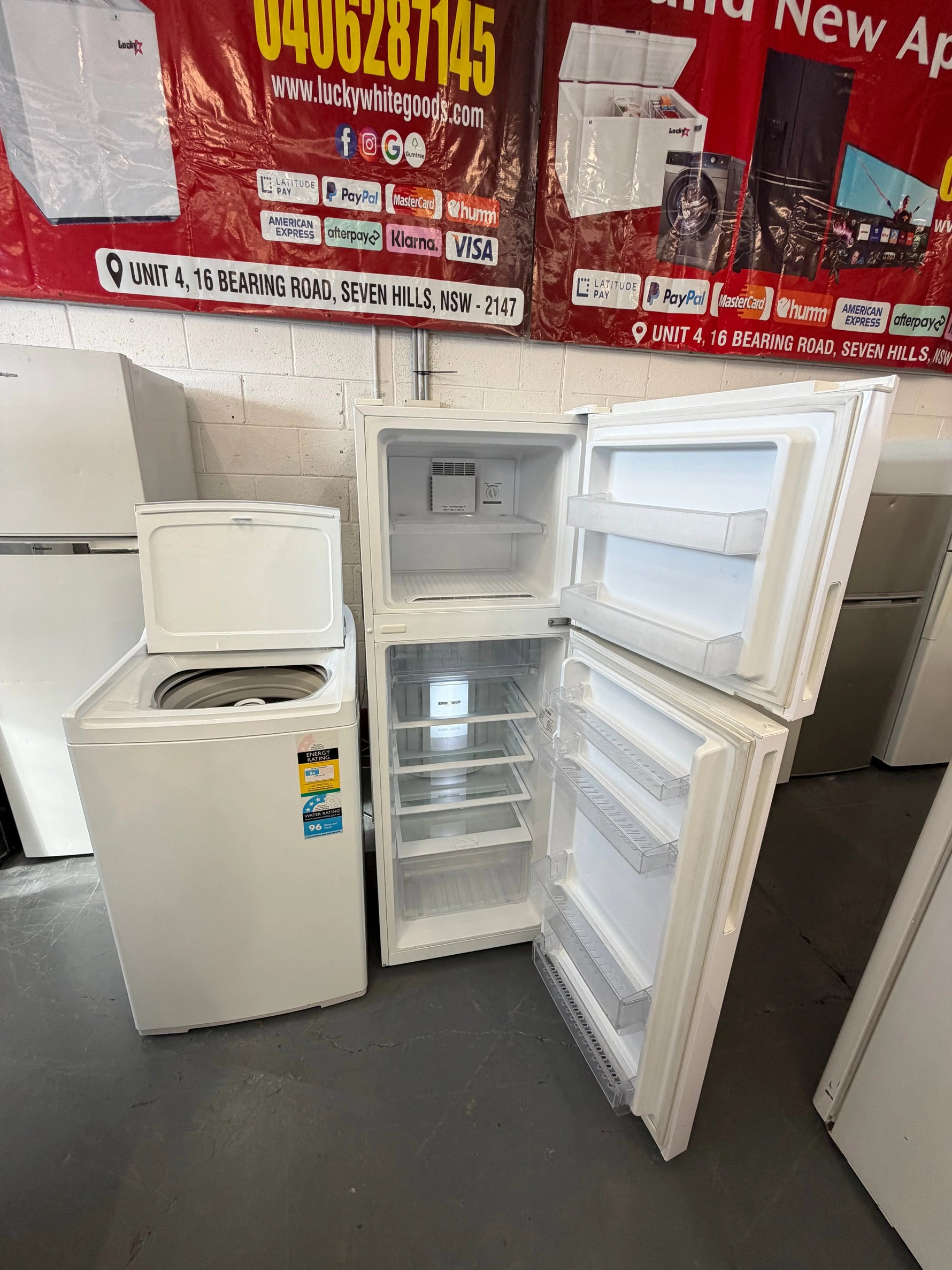 Refurbished Combo Haier 260 ltr top mount fridge freezer and Fisher & Paykel 8 kg top loader washer