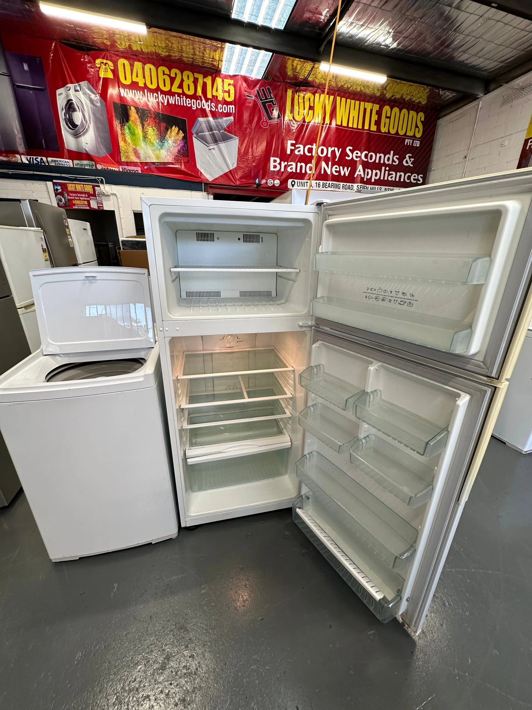 Refurbished Combo Westinghouse 420 ltr top mount fridge freezer & Fisher and Paykel 8 kg Top loader washer | SYDNEY