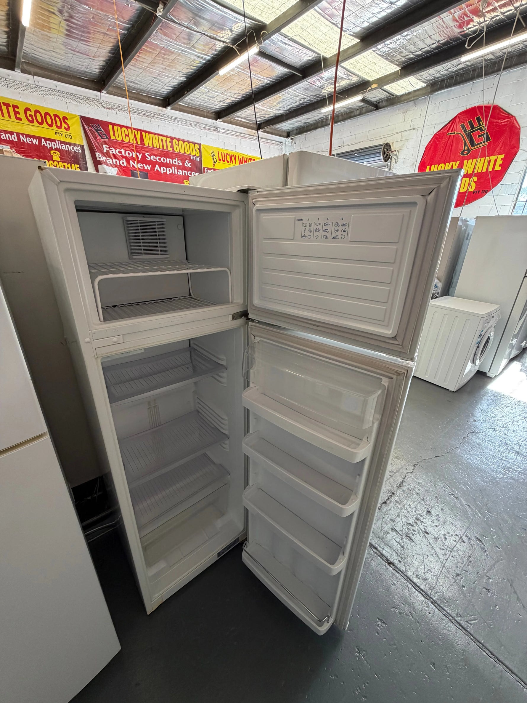 Refurbished Fisher & Paykel 248 ltr top mount fridge freezer