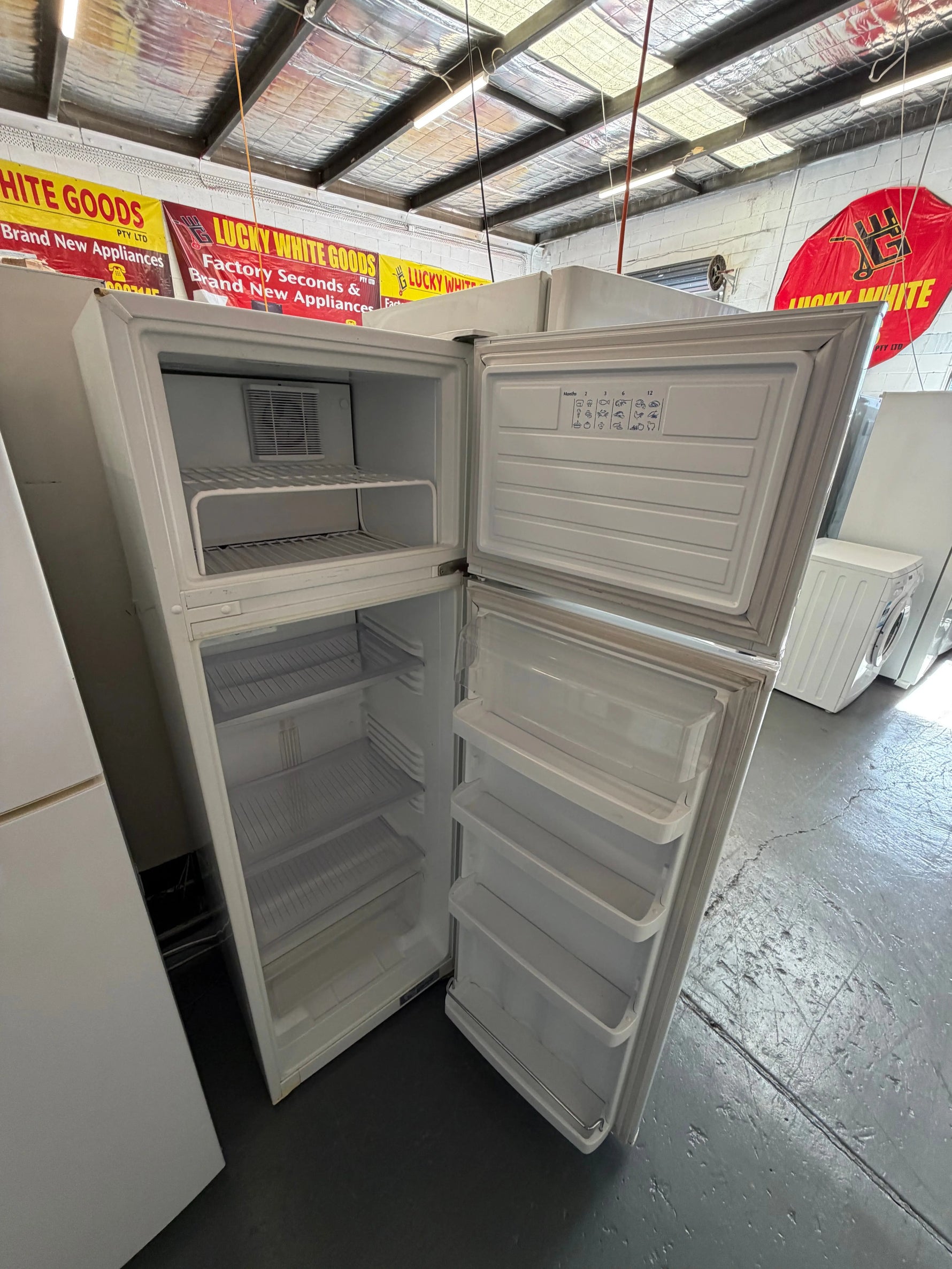 Refurbished Fisher & Paykel 248 ltr top mount fridge freezer