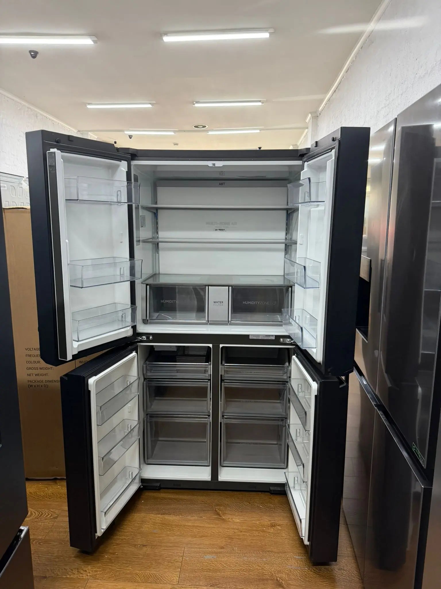 Refurbished Haier HRF680YPC 623L Quad Door Fridge with Ice & Water Dispenser – Black | RESERVOIR