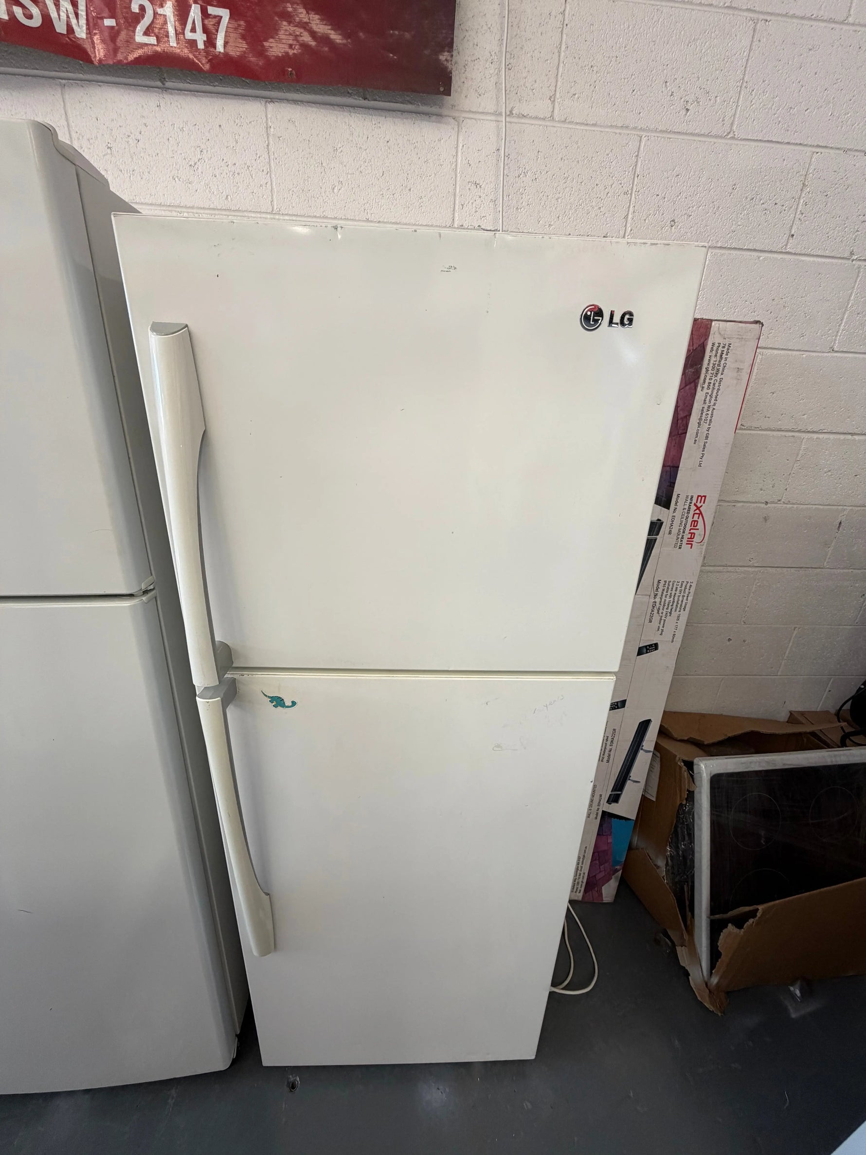 Refurbished Lg 315 ltr top mount fridge freezer