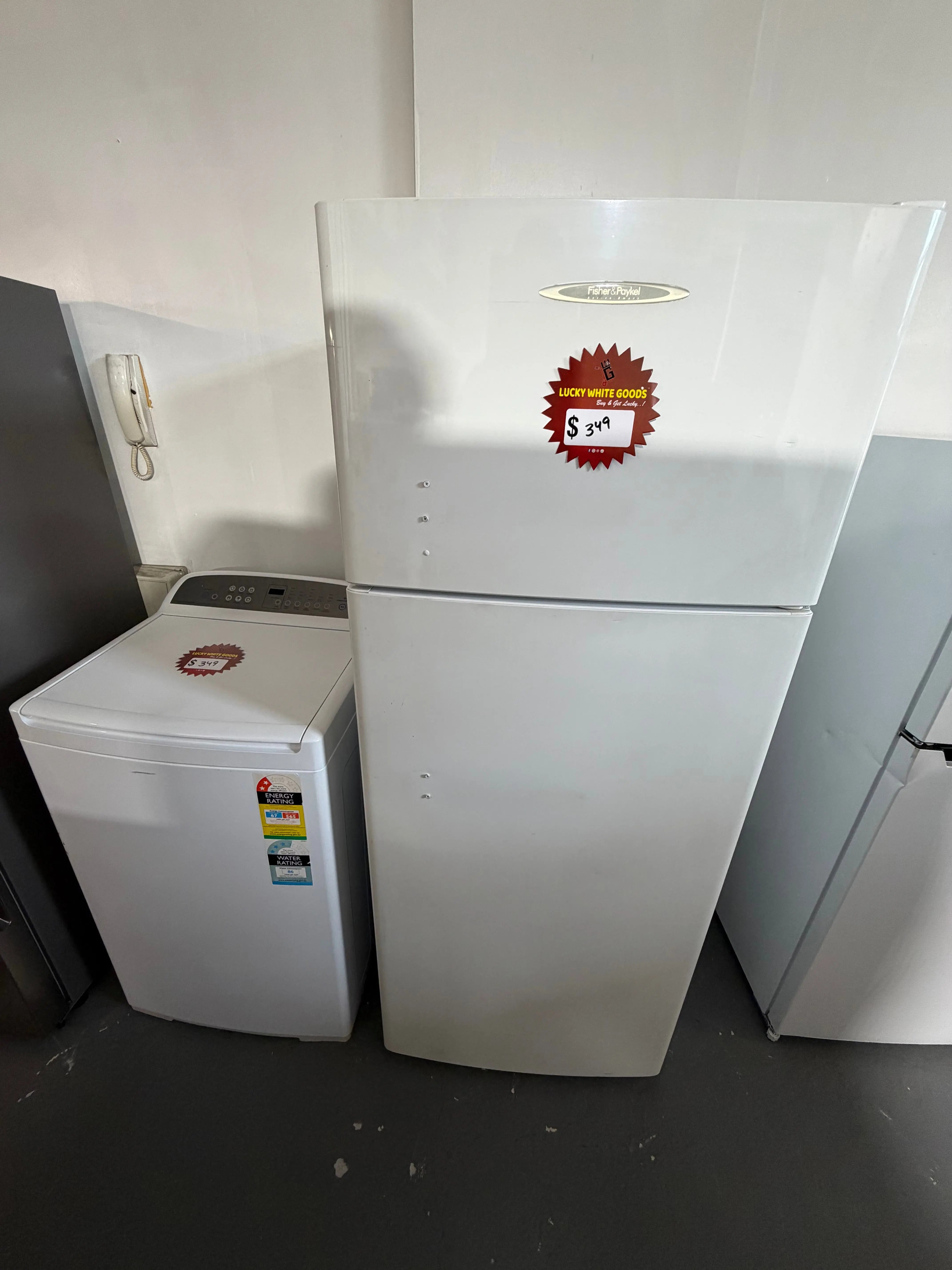 Refurbished combo Fisher & Paykel 400 ltr top mount fridge freezer and Fisher & Paykel 8 kg top loader washer | ALEXANDRIA