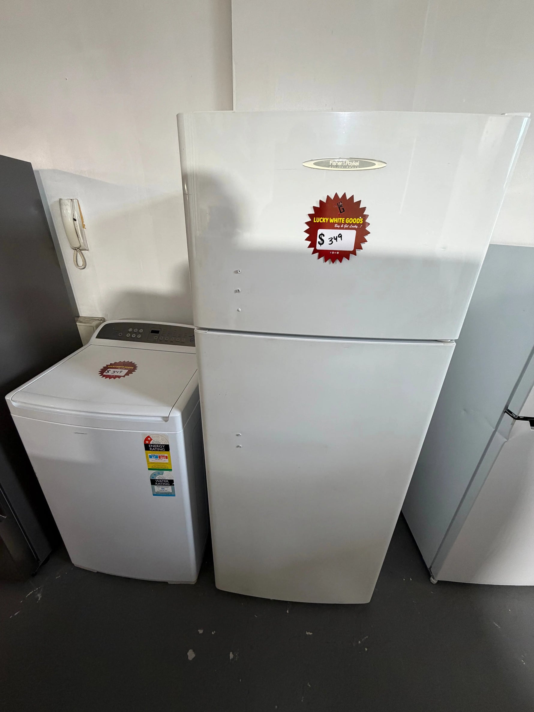 Refurbished combo Fisher & Paykel 400 ltr top mount fridge freezer and Fisher & Paykel 8 kg top loader washer | ALEXANDRIA