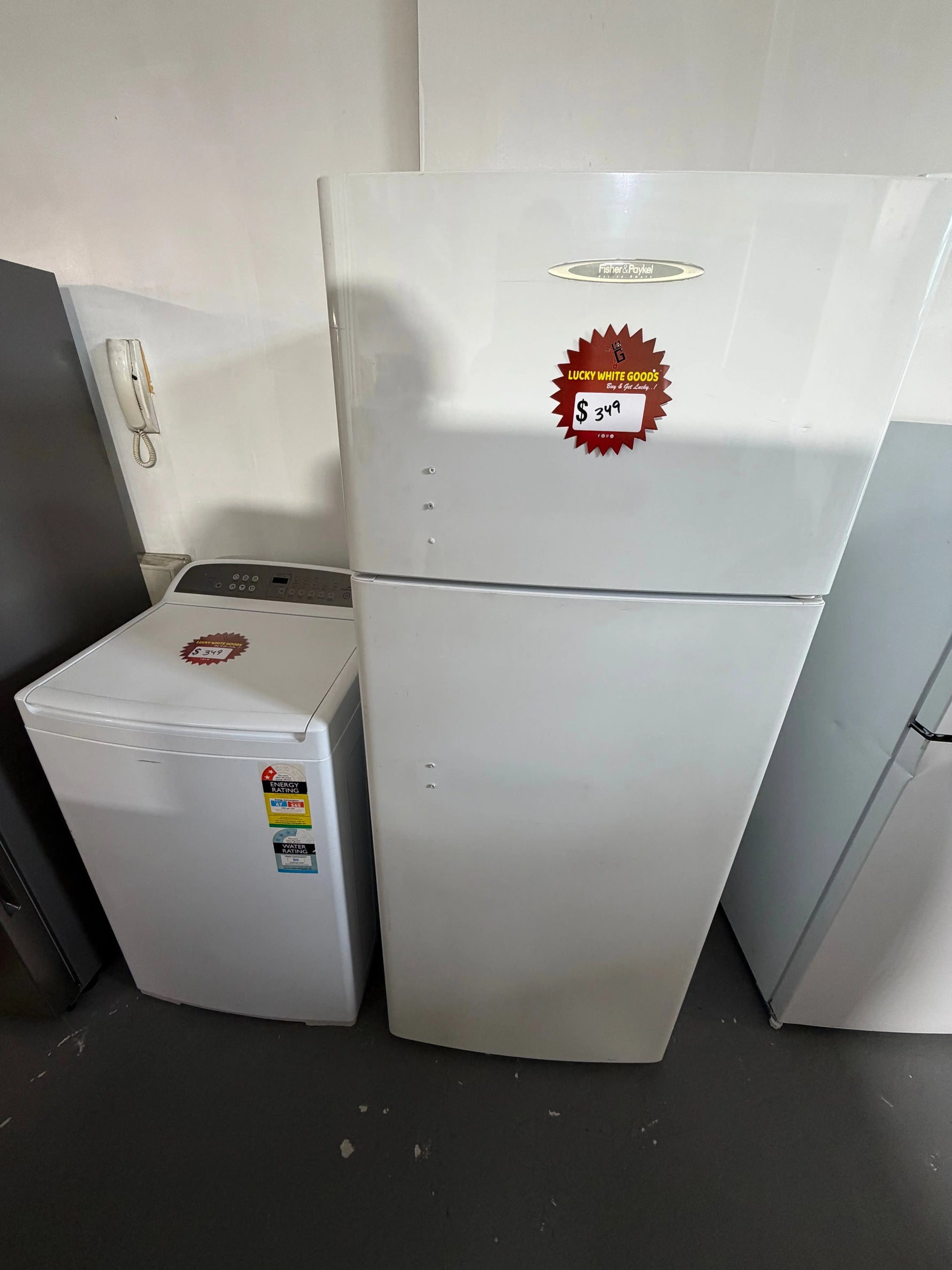 Refurbished combo Fisher & Paykel 400 ltr top mount fridge freezer and Fisher & Paykel 8 kg top loader washer | ALEXANDRIA