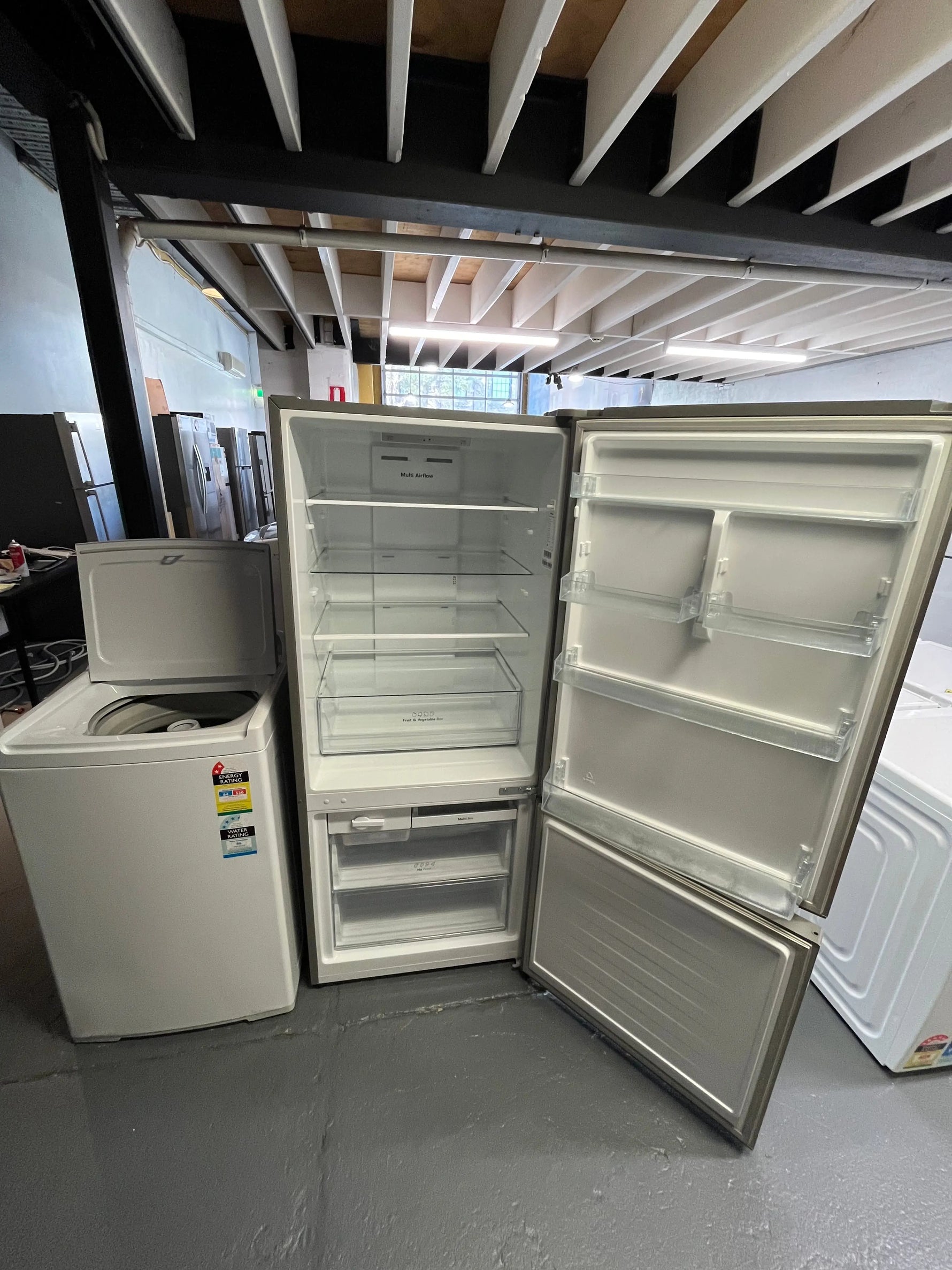 Refurbished combo Hisense 417 ltr bottom mount fridge freezer & Fisher & Paykel 7 kg top loader washer | ALEXANDRIA