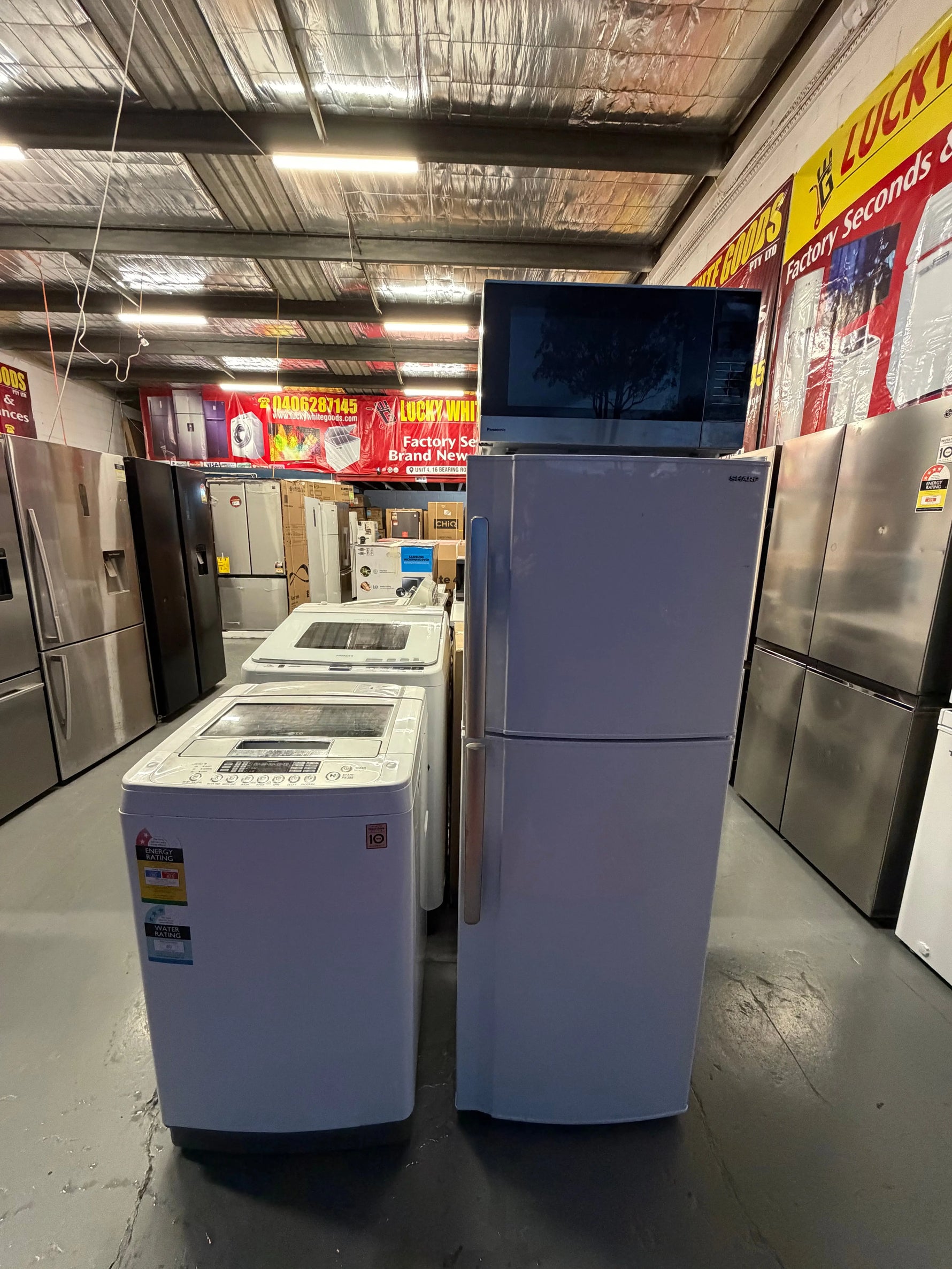 Refurbished combo Sharp  220 Ltr Top mount fridge freezer & Lg 5.5 kg Top loader washer with Panasonic 27 litre microwave