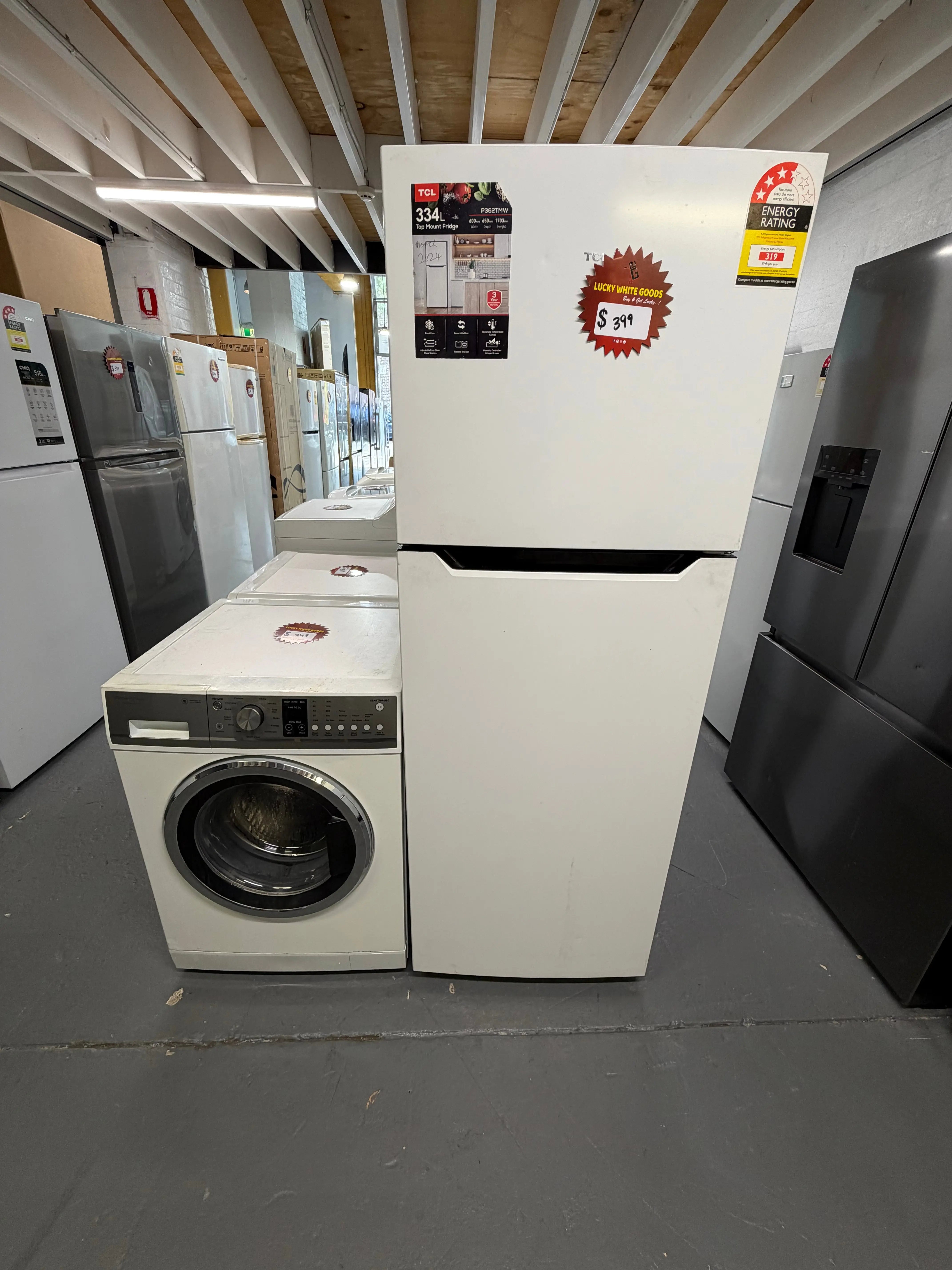Refurbished combo Tcl 334 ltr top mount fridge freezer and Fisher & Paykel 7.5 kg front loader washer | ALEXANDRIA