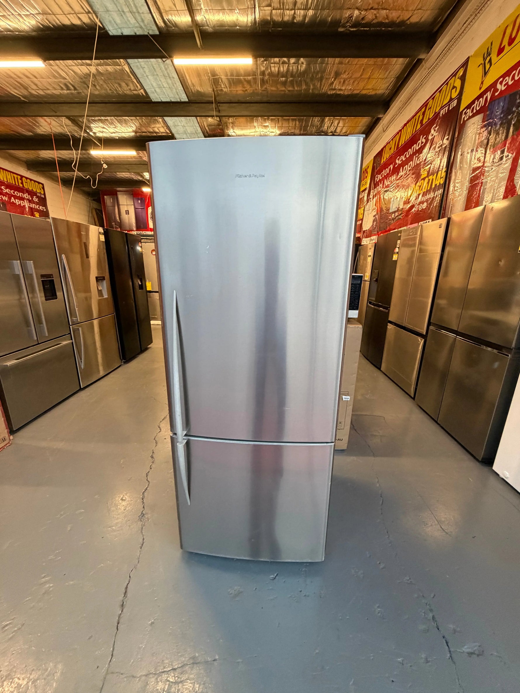 Refurbished fisher and Paykel 442 liters fridge freezer